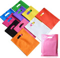 Plastic Party Favor Small Gift Bags, 100 PCS 6" x 8" Goodie Bags for Kids, Candy Treat Pouches Bulk with Handle for Kids' Birthday Party, Thanksgiving, Christmas, Halloween, 10 Colors
