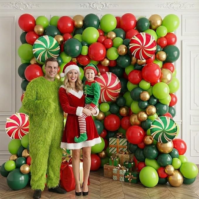 Christmas cartoon style party decorations include green red and gold balloon arch kit & candy canes lollipops gift boxes foil balloons & backdrop for Christmas New Year's Eve party decorations.