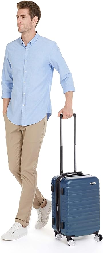 Amazon Basics 21" Hardside Carry-On Luggage with TSA Lock, Expandable, Organized Interior with Divider and Pockets, Spinner Wheels, Navy Blue