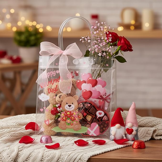 Henoyso 24 Pcs Valentines Clear Gift Bags Plastic Pink Candy Goodie Treat Bag Valentines Day Party PVC Totes with Handles Ribbon Galentines Day Party Favors, 7.8 x 7.8 x 3.1 Inches