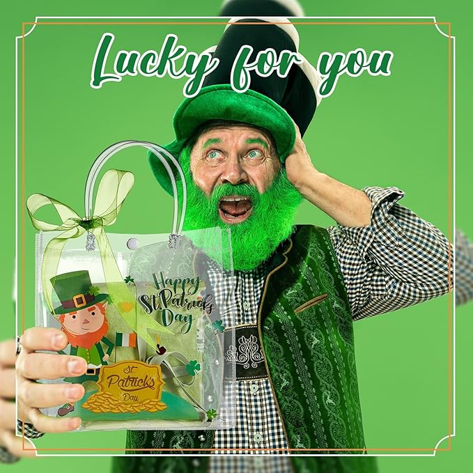 Henoyso 24 Pcs St. Patrick's Day Clear Gift Bags Plastic Shamrock Party Favor Bags with Handles and Ribbon Green Lucky Clover PVC Totes for Irish Candy Goodie Treat Gift Wrap, 7.8 x 7.8 x 3.1 Inches