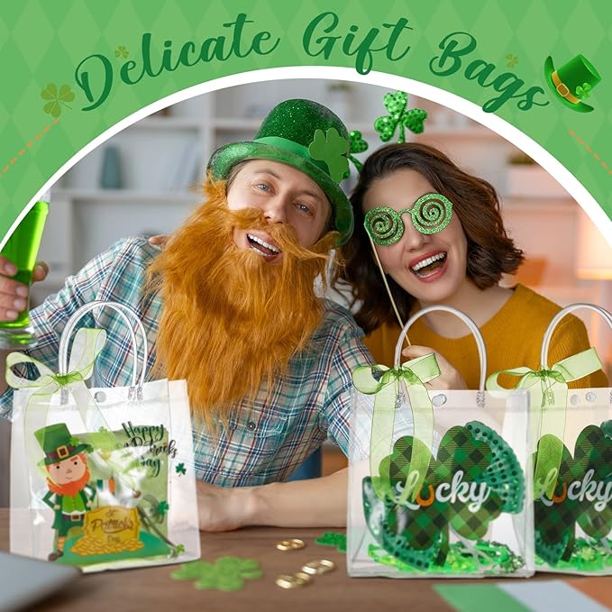 Henoyso 12 Pcs St. Patrick's Day Clear Gifts Bag Plastic Shamrock Party Favor Bags with Handles and Ribbon Green Lucky Clover Gift Bags 7.8 x 7.8 x 3.1 PVC Totes for Irish Goodie Treat Gift Wrap