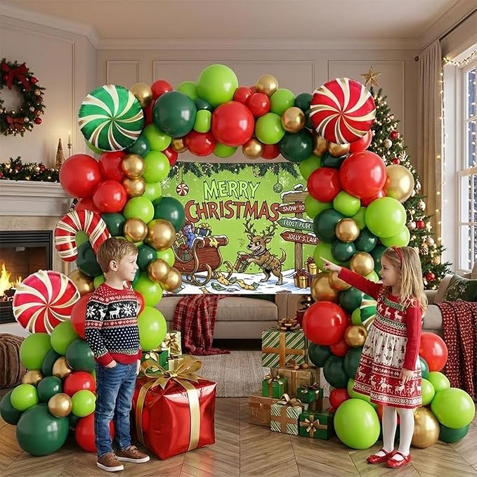 Christmas cartoon style party decorations include green red and gold balloon arch kit & candy canes lollipops gift boxes foil balloons & backdrop for Christmas New Year's Eve party decorations.