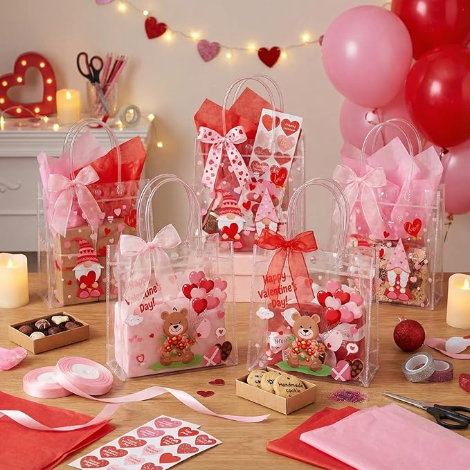 Henoyso 24 Pcs Valentines Clear Gift Bags Plastic Pink Candy Goodie Treat Bag Valentines Day Party PVC Totes with Handles Ribbon Galentines Day Party Favors, 7.8 x 7.8 x 3.1 Inches