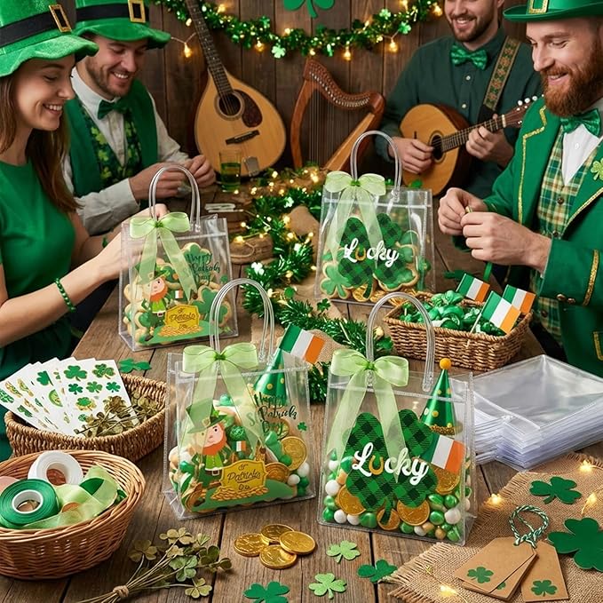 Henoyso 12 Pcs St. Patrick's Day Clear Gifts Bag Plastic Shamrock Party Favor Bags with Handles and Ribbon Green Lucky Clover Gift Bags 7.8 x 7.8 x 3.1 PVC Totes for Irish Goodie Treat Gift Wrap