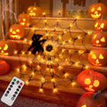Halloween Decorations Spider Web Lights - 4FT Diameter 70 LEDs with Black Spider, Waterproof Net Lights, Remote Control, 8 Modes Cobweb Halloween Decorations for House Garden Indoor Outdoor (Orange)