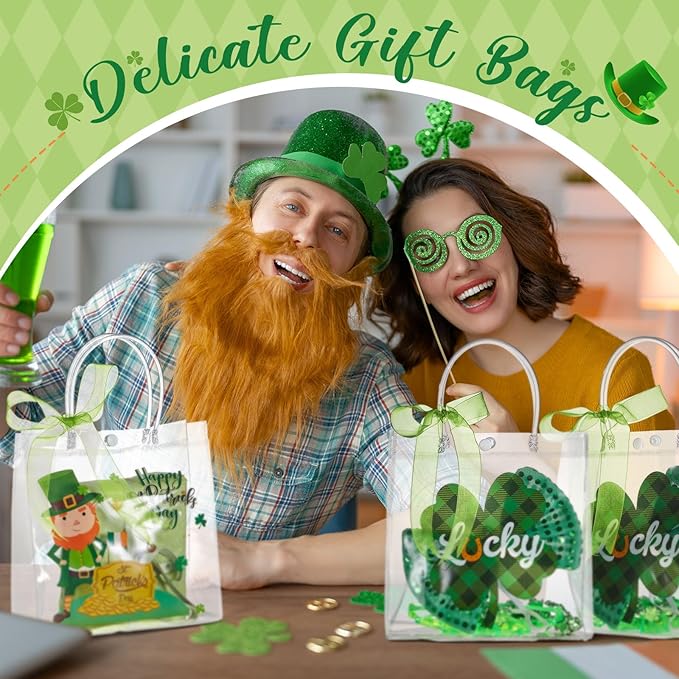 Henoyso 24 Pcs St. Patrick's Day Clear Gift Bags Plastic Shamrock Party Favor Bags with Handles and Ribbon Green Lucky Clover PVC Totes for Irish Candy Goodie Treat Gift Wrap, 7.8 x 7.8 x 3.1 Inches