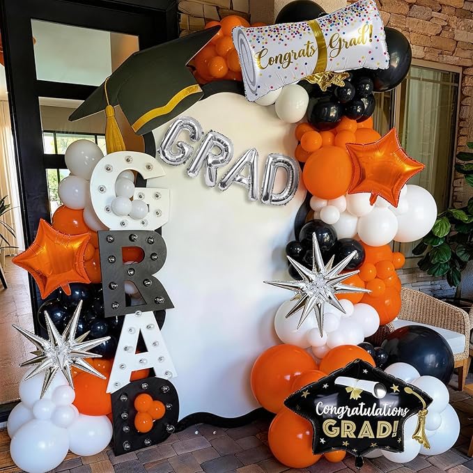 Orange Graduation Balloons Garland Arch Kit, 117PC Orange Black White Graduation Star Print Certificate Grad Foil Balloon with Silver Explosion Star Balloon for Graduate Class of 2026 Prom Party Decor