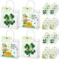 Henoyso 24 Pcs St. Patrick's Day Clear Gift Bags Plastic Shamrock Party Favor Bags with Handles and Ribbon Green Lucky Clover PVC Totes for Irish Candy Goodie Treat Gift Wrap, 7.8 x 7.8 x 3.1 Inches